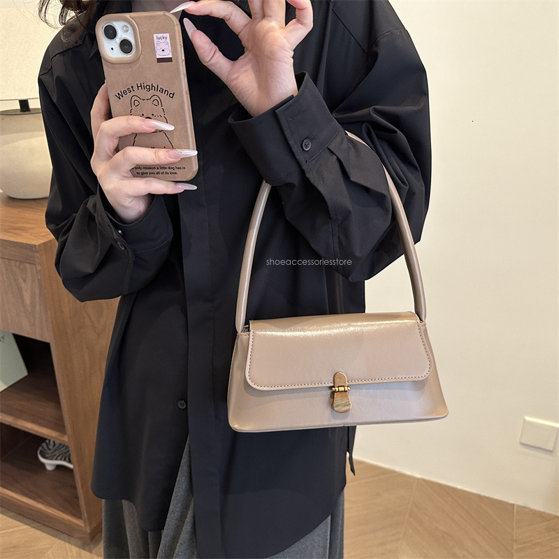 2025 New Fashion Designer PU Handheld Multi Functional Inner Shoulder Women's Bag Niche Western Underarm Bag