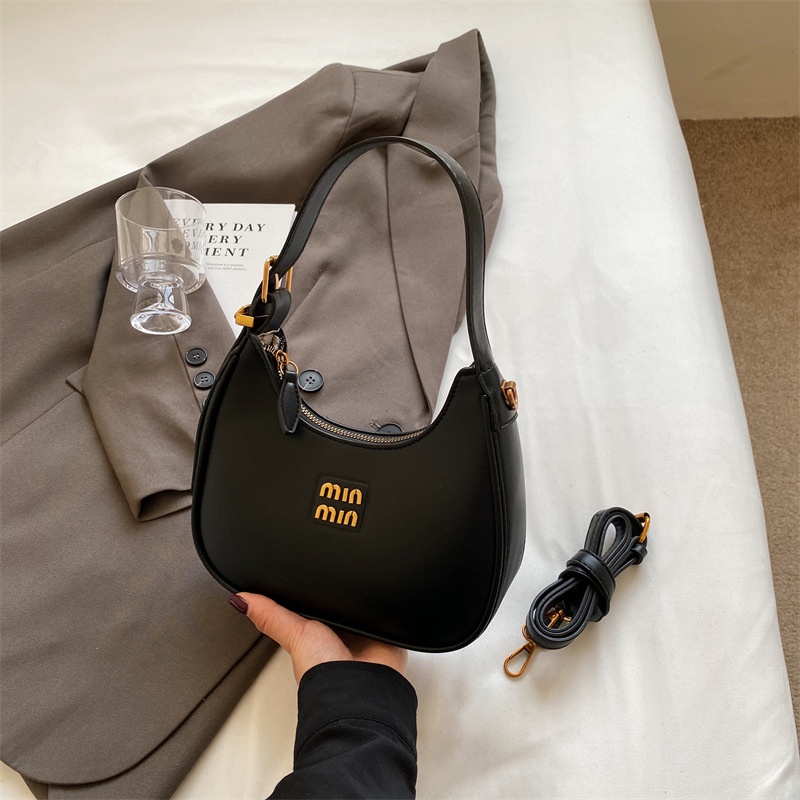 2025 New Free Shipping Hot selling Women's Bag Simple and Versatile Underarm Bag Designer black white color Women's Versatile Fashion Handba