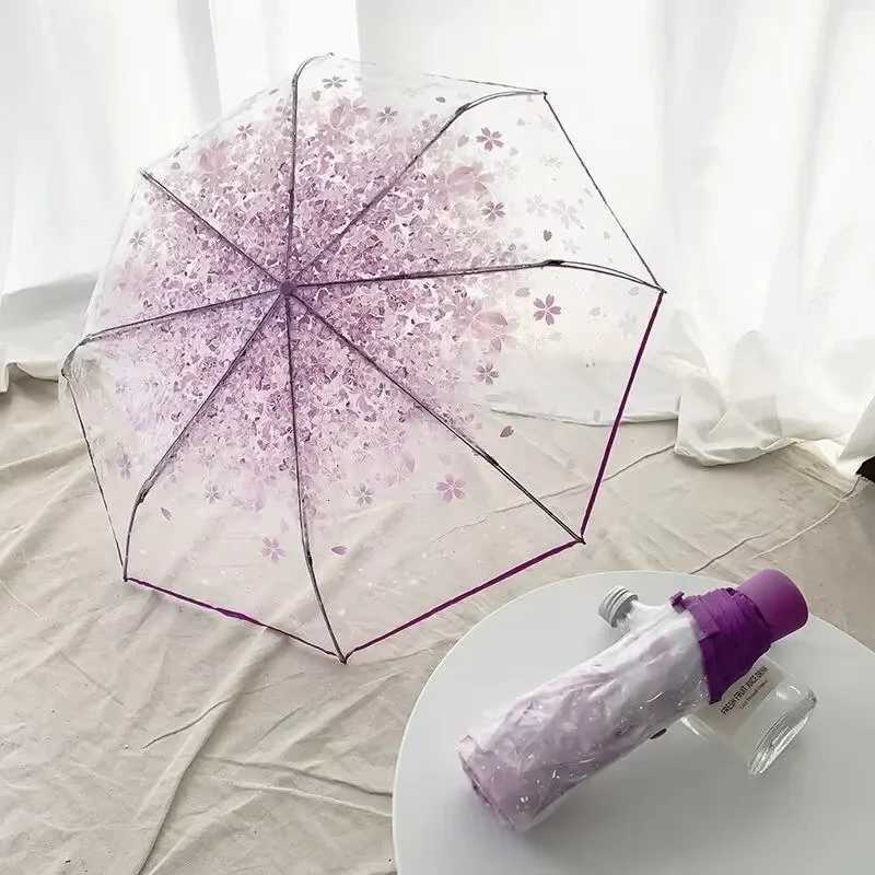 This transparent cherry blossom umbrella features a stylish and unique three-fold design presenting a fresh and simple aestheticM251122