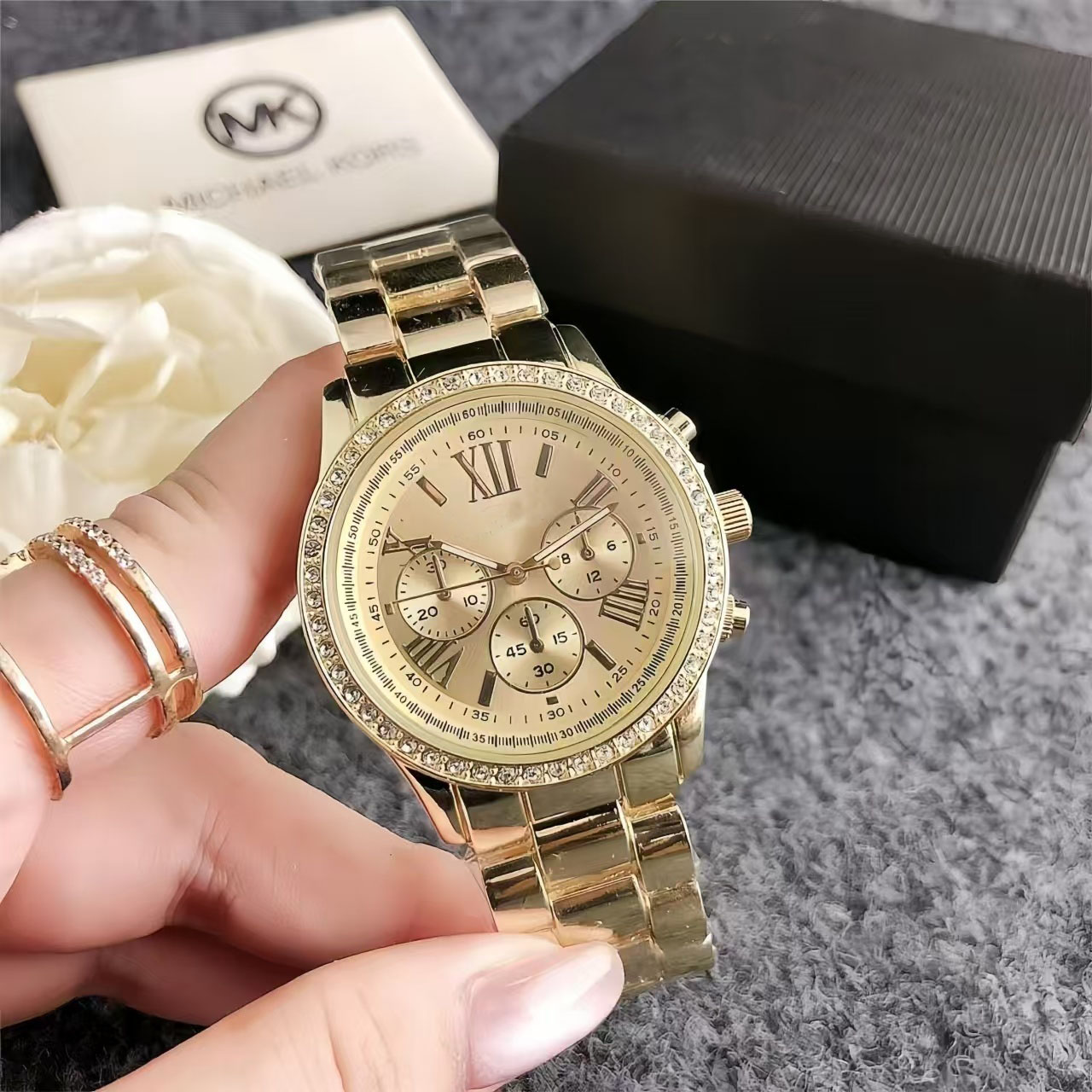 Rose gold diamond-encrusted luxury watches for men and women with large dials and three eyes new online celebrity watches.