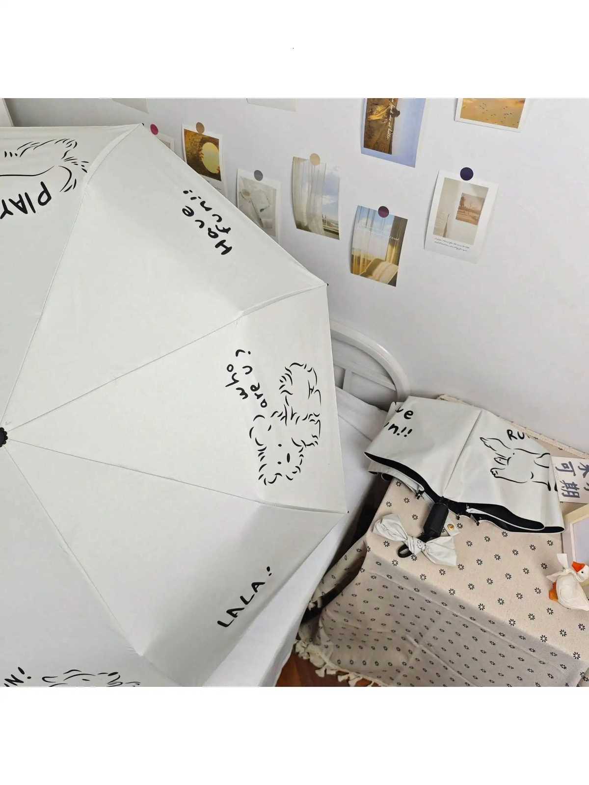 1 simple and stylish umbrella with cartoon pattern and dog pattern Three fold umbrella for sun protection and UV protectionM251122