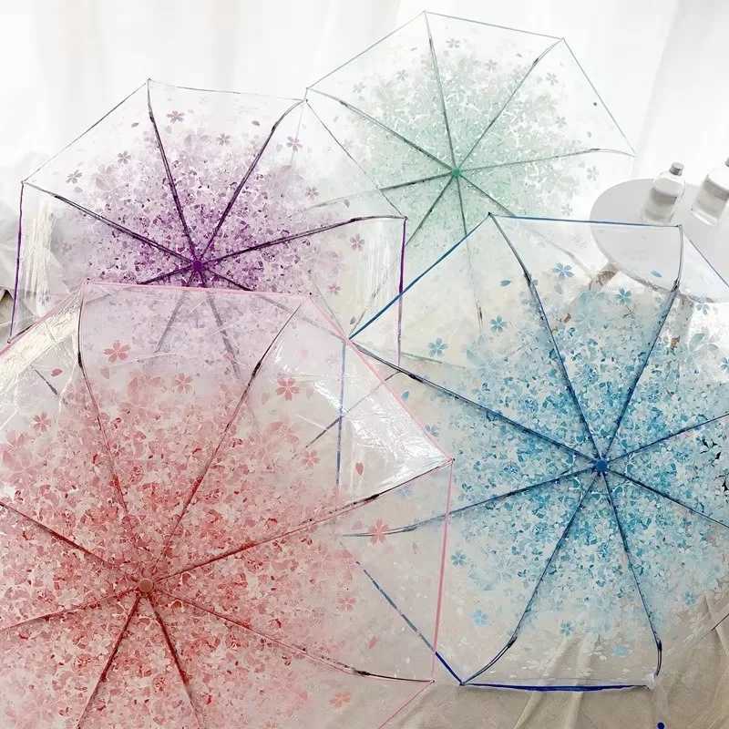 This transparent cherry blossom umbrella features a stylish and unique three-fold design presenting a fresh and simple aestheticM251122