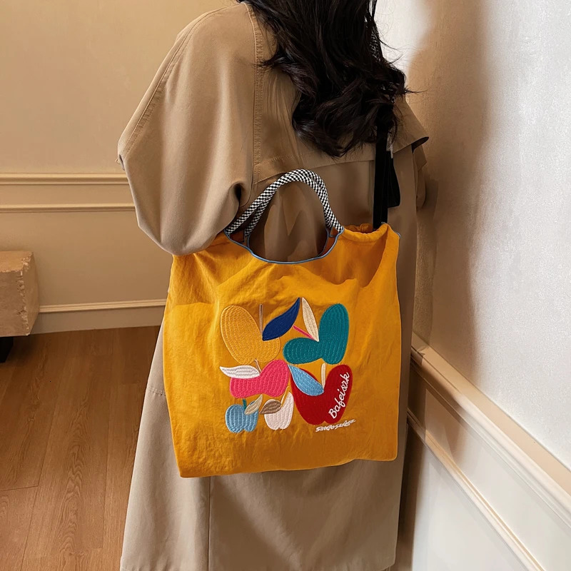 womens handbag lazy in the wind Japanese embroidery fashionable clown large capacity durable shoulder bag commuting messenger 250421