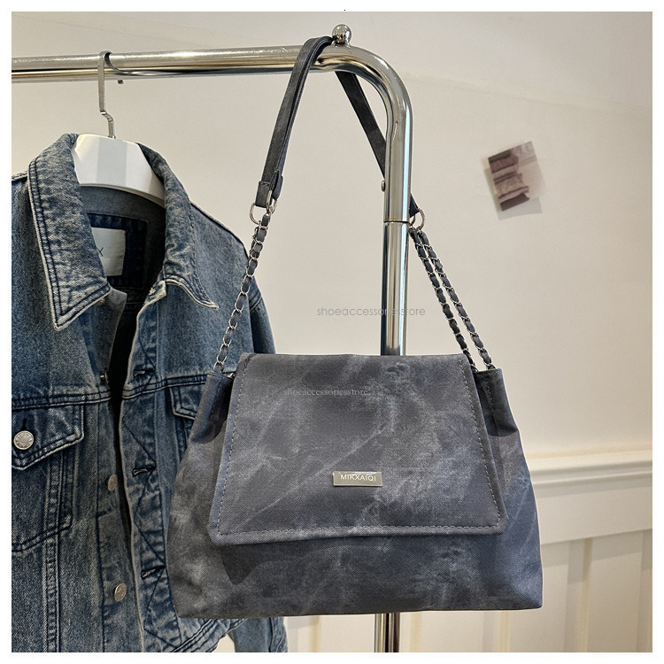 2025 New Designer Light Luxury Commuter High End Multi Functional Handchain Armpit Bag Simple Large Capacity Single Shoulder Crossbody Bag
