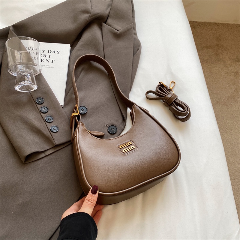 2025 New Free Shipping Hot selling Women's Bag Simple and Versatile Underarm Bag Designer black white color Women's Versatile Fashion Handba
