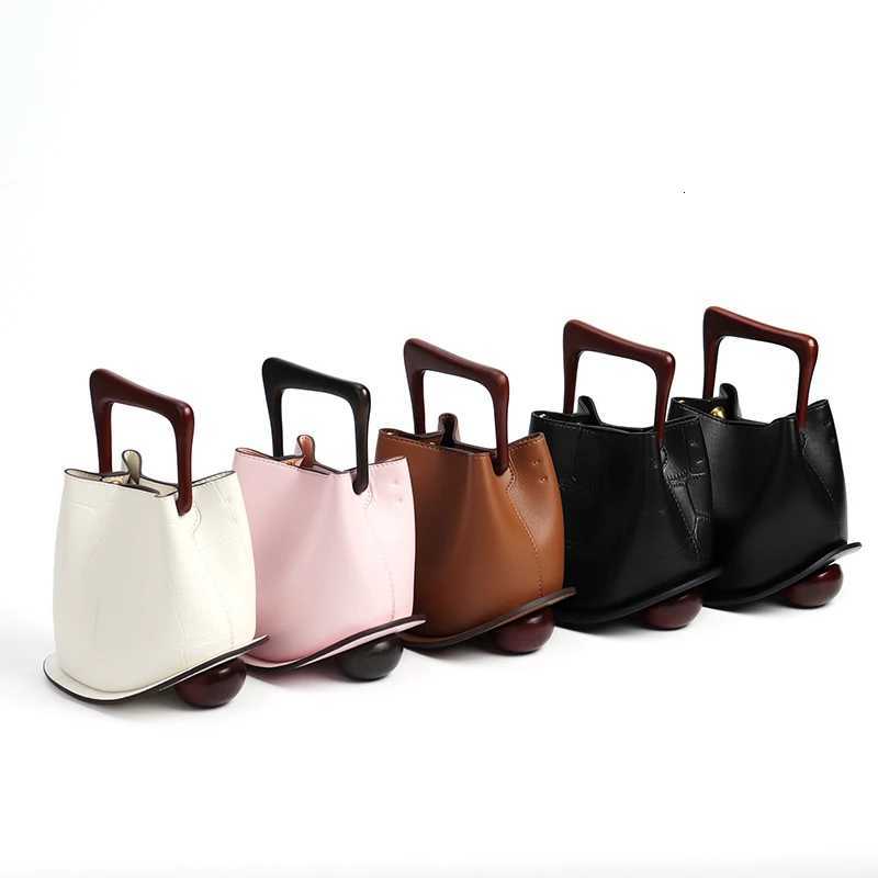 High-grade Vintage Leather Wooden Handle Bucket Bag New Irregular Niche Design Bag Casual Everything K251121