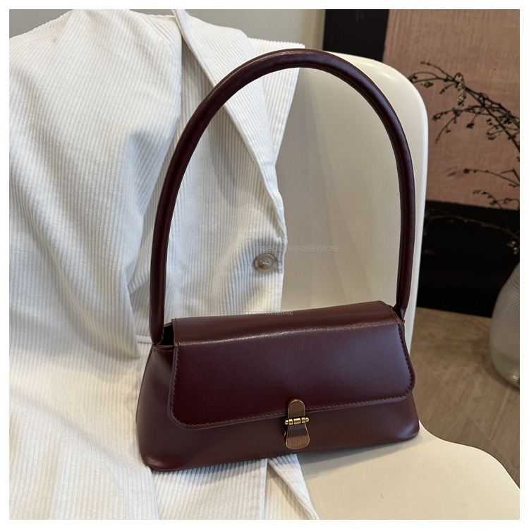 2025 New Fashion Designer PU Handheld Multi Functional Inner Shoulder Women's Bag Niche Western Underarm Bag