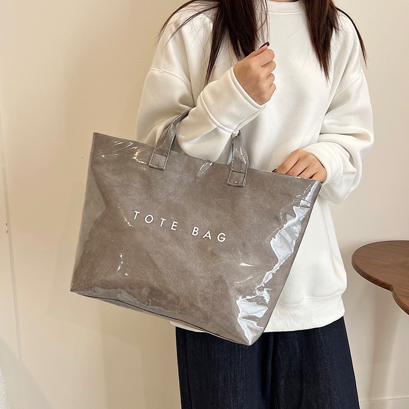 Luxury Brand Designer Bag 2025 New Designer Bag Large Capacity Kraft Paper Jelly PVC Transparent Waterproof For Work Commuting, One Shoulder Crossbody