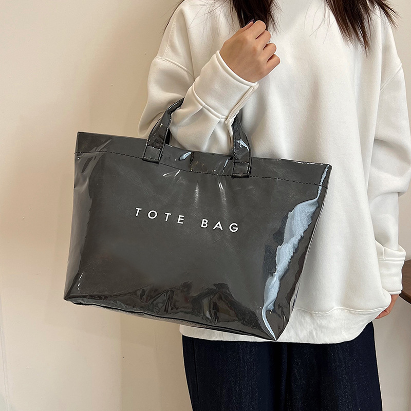Luxury Brand Designer Bag 2025 New Designer Bag Large Capacity Kraft Paper Jelly PVC Transparent Waterproof For Work Commuting, One Shoulder Crossbody
