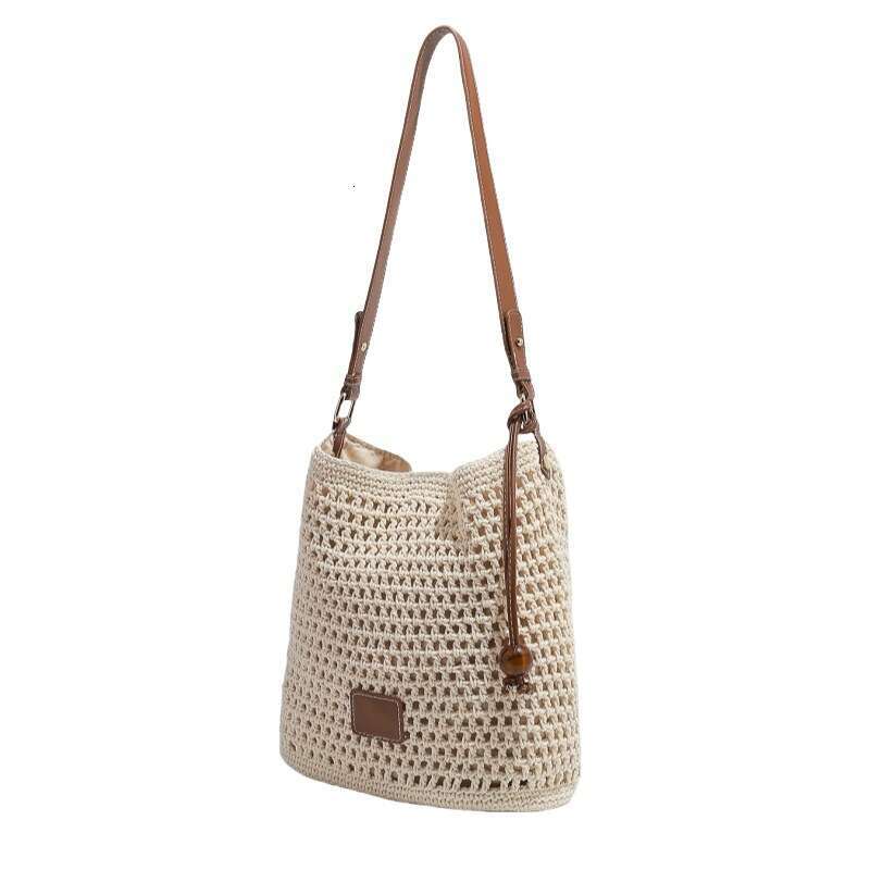Ins Style Resort Beach Bag New Woven Hollow Out Spring And Summer Seaside Vacation Tote Beach Shoulder Bag Small Handbag KQ