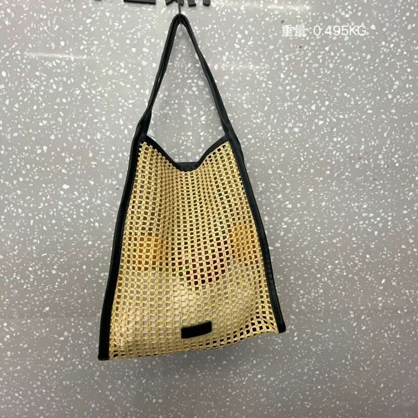 Ins Style Resort Beach Bag New Fashionable Simple Handbag One Shoulder Underarm Hollow Grass Woven Seaside Fake Mother And Child Bag KQ