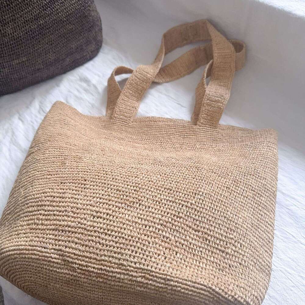 Ins Style Resort Beach Bag New Summer Women S Lafite Handmade Hook Grass Fashionable And Simple Shoulder Bag Beach Vacation Handbag KQ