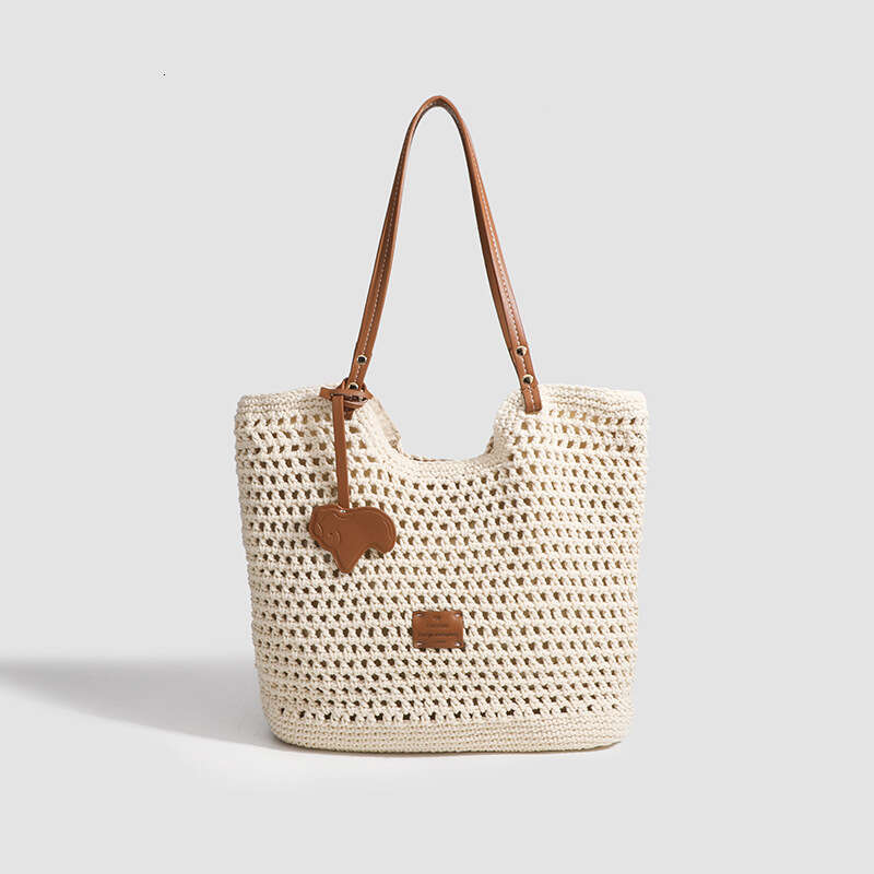 Ins Style Resort Beach Bag Shanxia Nanfeng Women S Handheld Straw Woven Large Capacity Seaside Vacation Hollow Summer Shoulder Bag KQ