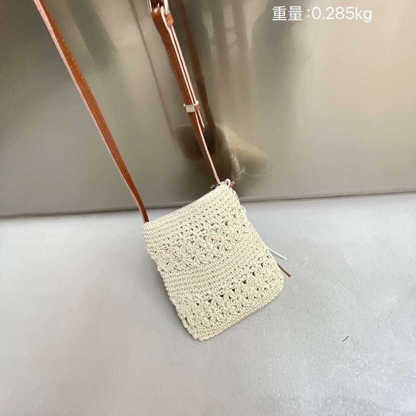 Ins Style Resort Beach Bag New Internet Celebrity Color Contrasting Cowhide Weaving Hollow Cell Phone Bag Seaside Vacation Travel Single Shoulder Cros