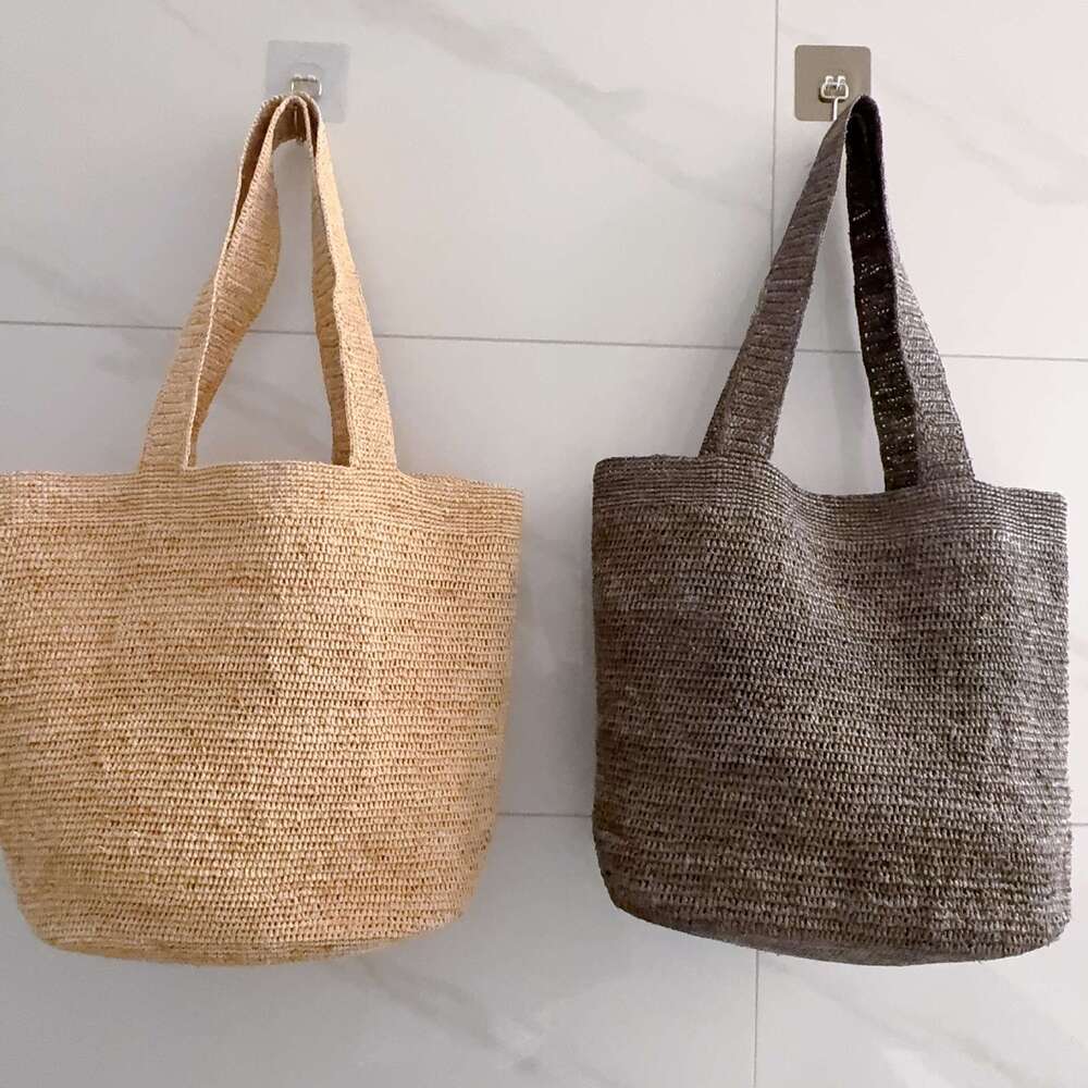 Ins Style Resort Beach Bag New Summer Women S Lafite Handmade Hook Grass Fashionable And Simple Shoulder Bag Beach Vacation Handbag KQ