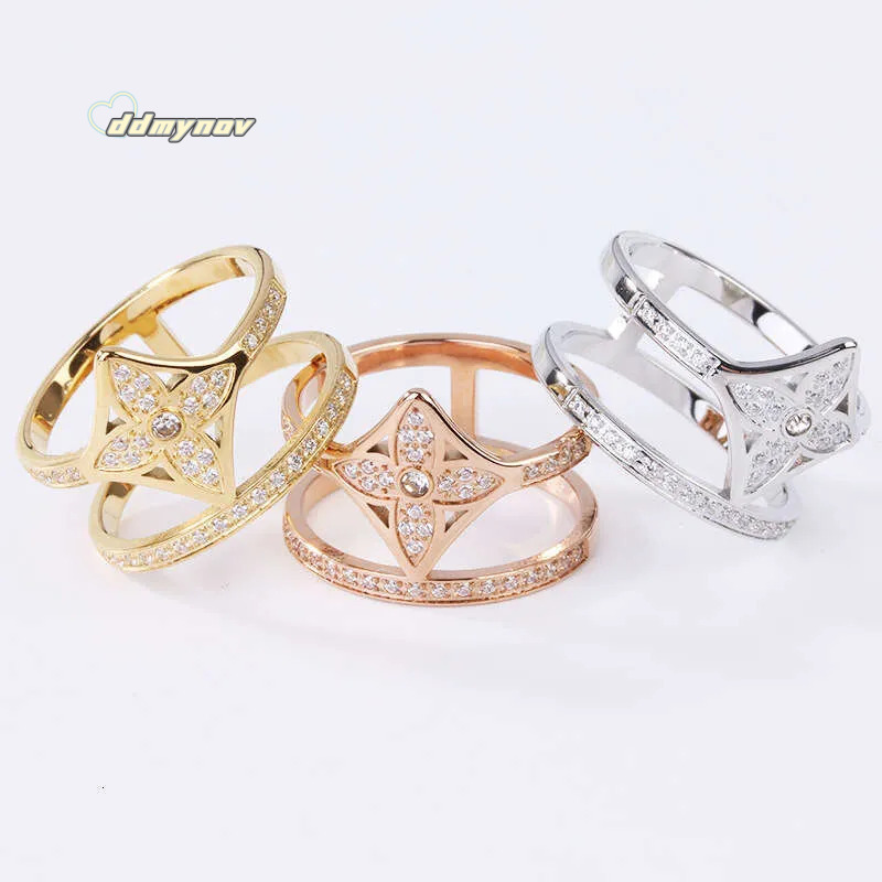 collections Luxury European American Ins style Lucky Flower inspired Diamond inlaid Fake Two - piece Ring for Women ddmynov