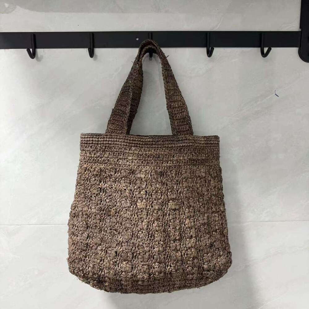 Ins Style Resort Beach Bag Lafite Solid Color Hollow Grass Handbag New Small Design Handmade Woven Beach Vacation Bag KQ