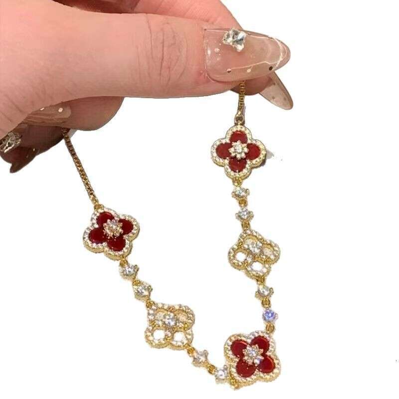2025 hot Clover Bracelet Designer jewelry Diamond flower hollow out pull-out bracelet light luxury high end feel fashionable commuting versatile 4 Lea