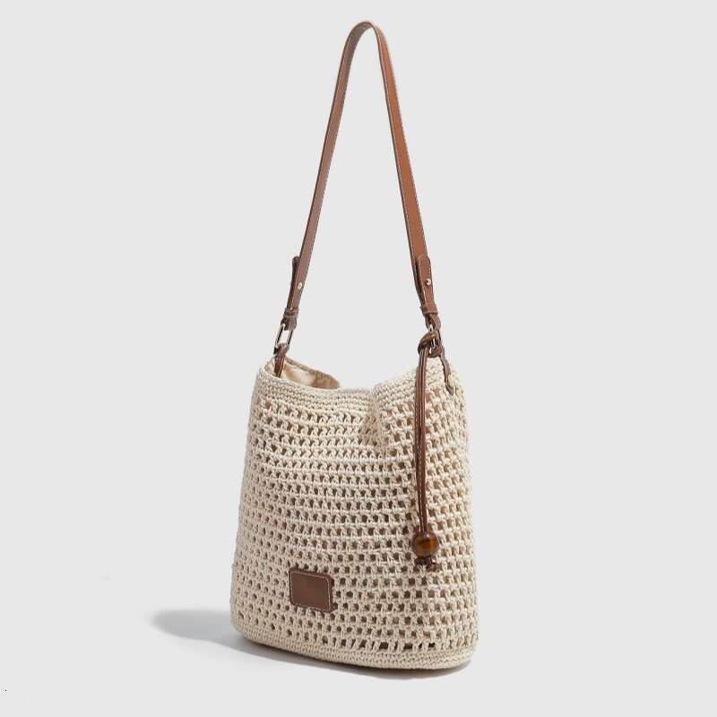 Ins Style Resort Beach Bag New Woven Hollow Out Spring And Summer Seaside Vacation Tote Beach Shoulder Bag Small Handbag KQ