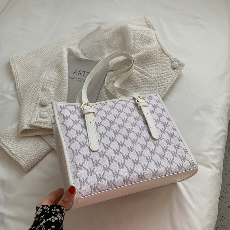 Modern Elegant Multi-Purpose Ladies Travel Bags & Casual Everyday Carryall Clutches Featuring Eye-Catching Graphics