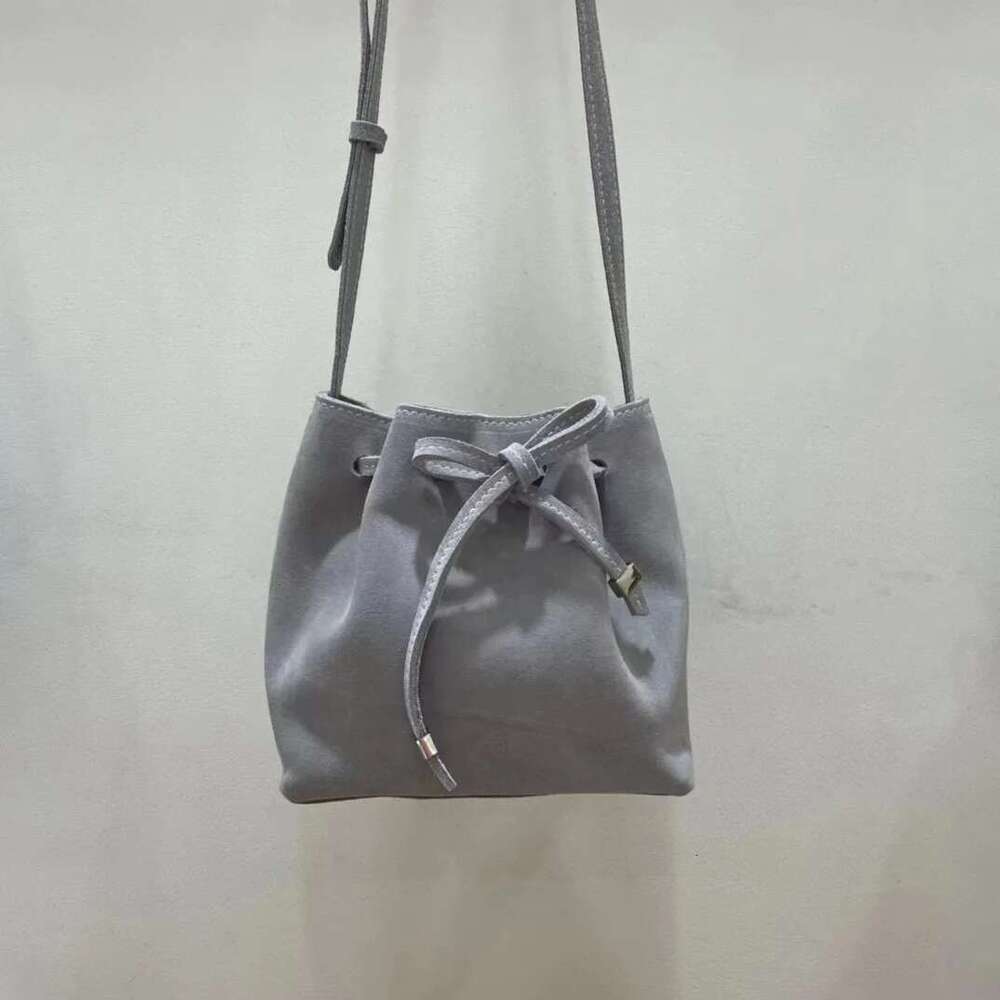 2025 New Frosted Leather Shoulder Bucket Women's Small Crowd Skew Straddle Bag Designer's bag