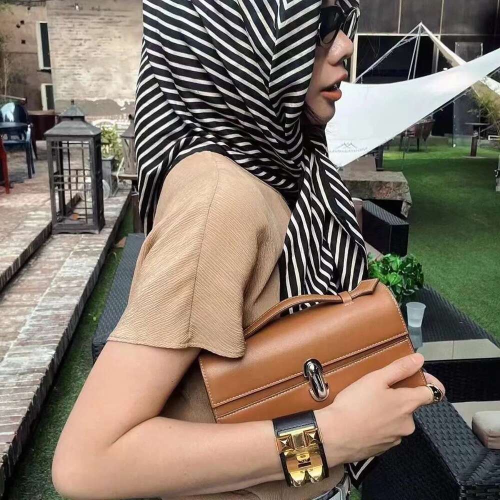 Retro 2025 New Light Women's Suede Frosted Flip Small Square Genuine Leather Handheld Bag Designer's bag Designer's bag