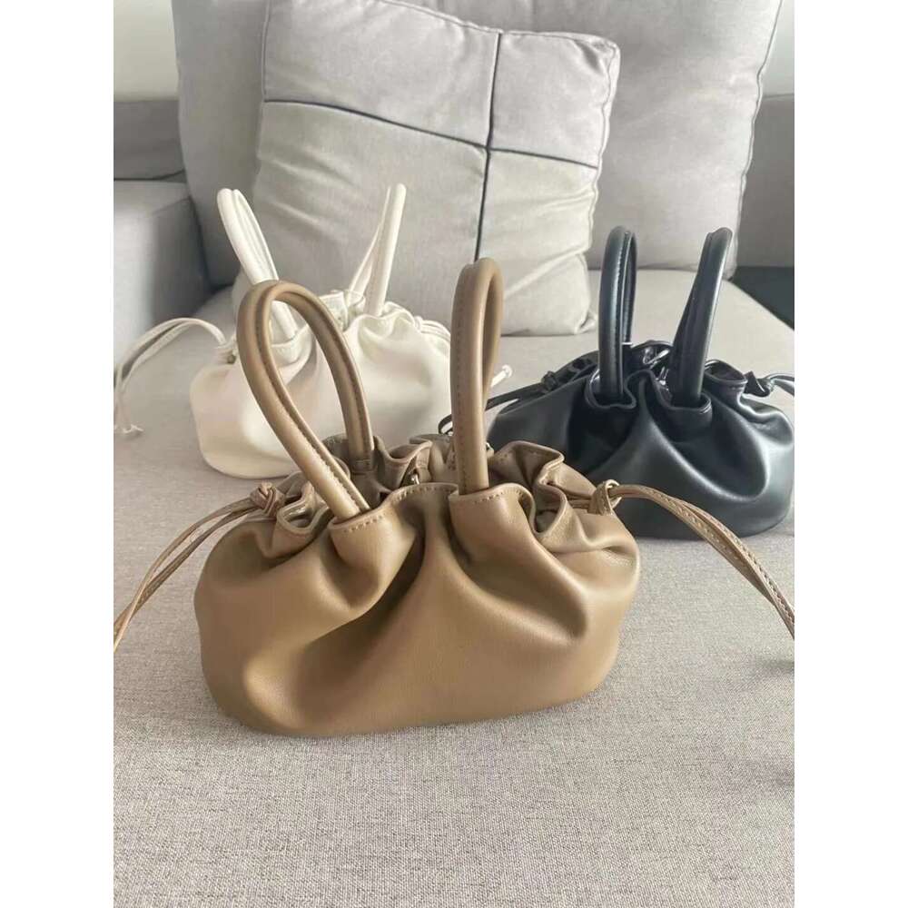 2025 New Mini Wrinkle Texture Handheld Women's With Genuine Leather Streamed Leisure One Shoulder Oblique Straddle Bag Designer's bag Design