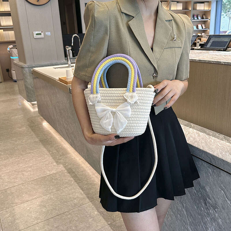 Ins Style Resort Beach Bag New Rainbow Handheld Small Handmade Cotton Thread Women S Straw Woven Cute And Versatile Beach Vacation Bag KQ