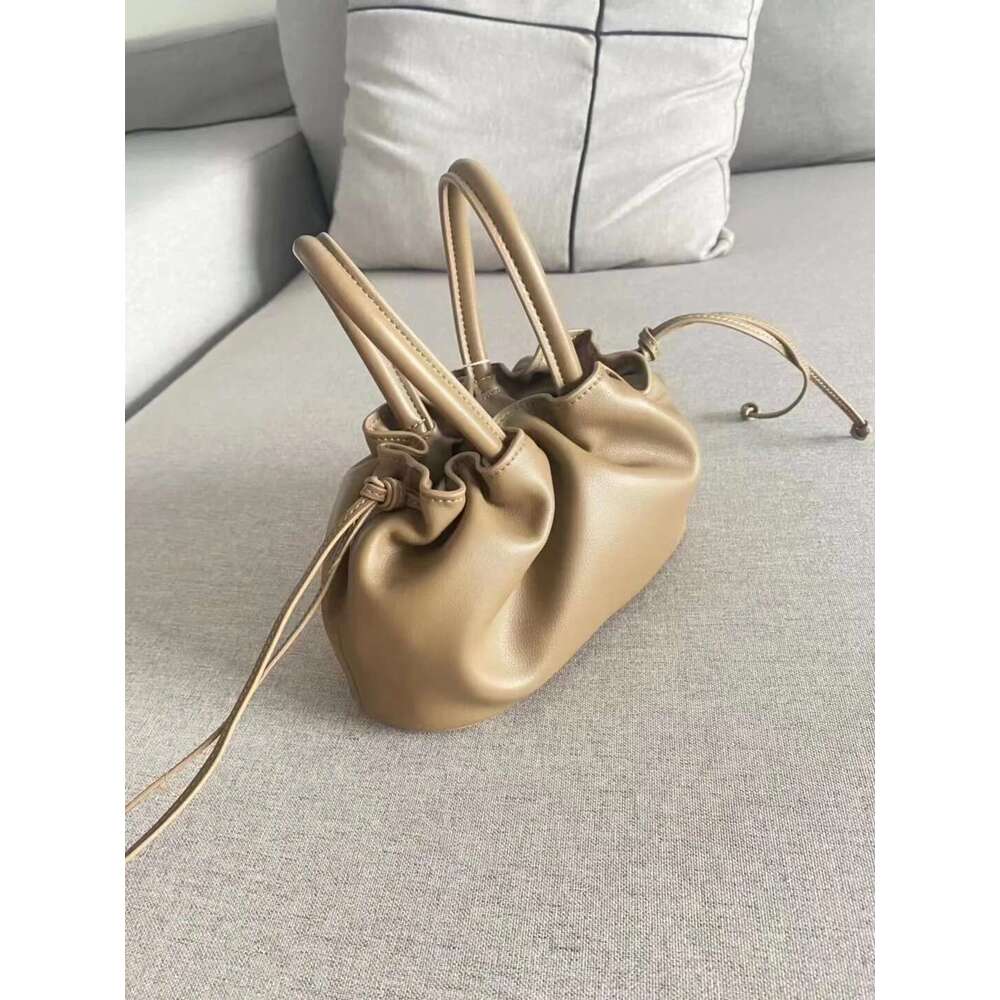 2025 New Mini Wrinkle Texture Handheld Women's With Genuine Leather Streamed Leisure One Shoulder Oblique Straddle Bag Designer's bag Design