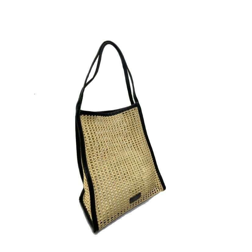 Ins Style Resort Beach Bag New Fashionable Simple Handbag One Shoulder Underarm Hollow Grass Woven Seaside Fake Mother And Child Bag KQ