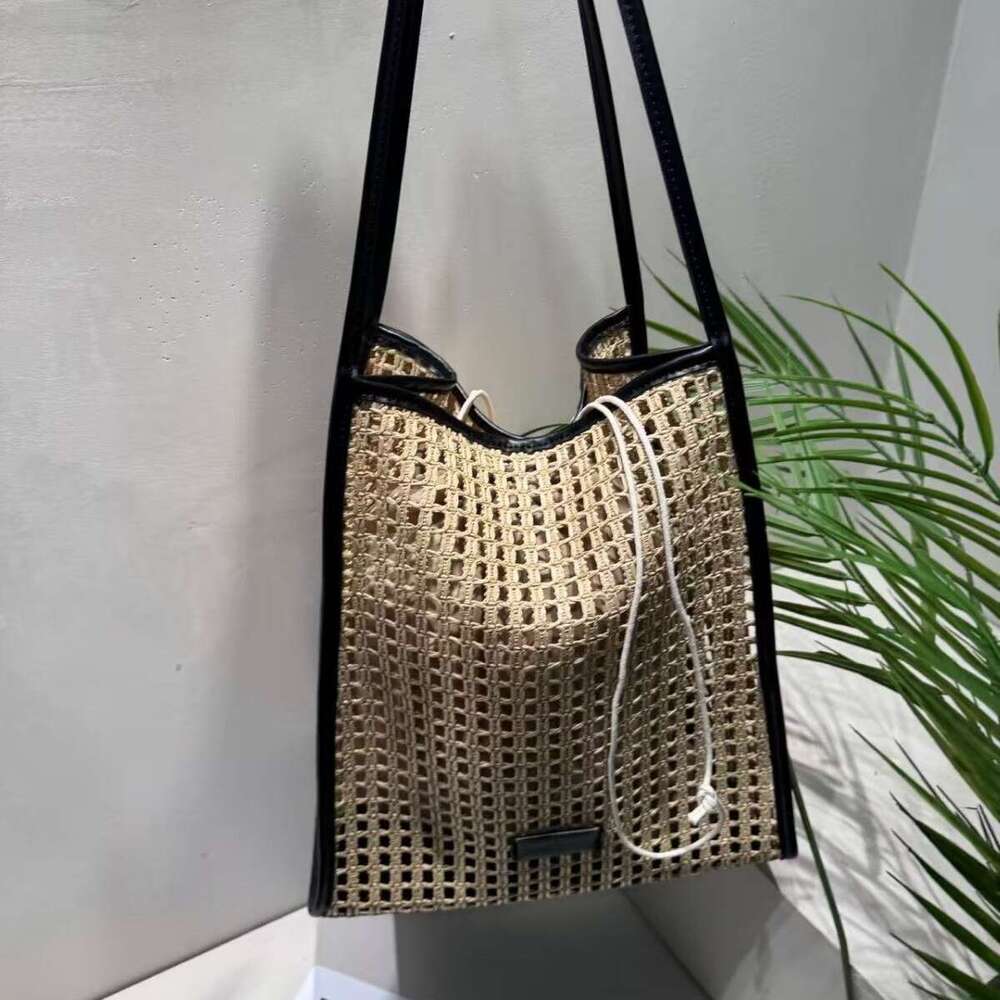 Ins Style Resort Beach Bag New Fashionable Simple Handbag Single Shoulder Underarm Hollow Grass Woven Seaside Vacation Bag Large Capacity KQ