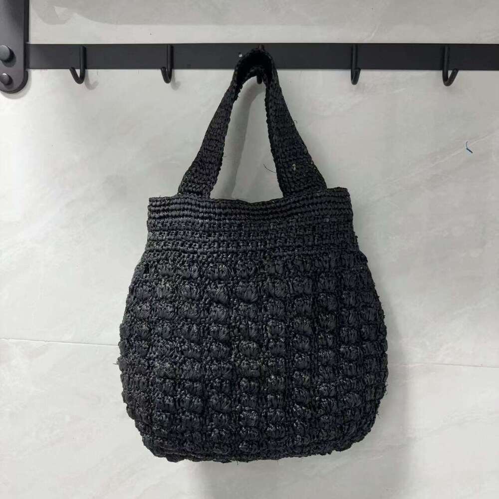 Ins Style Resort Beach Bag Lafite Solid Color Hollow Grass Handbag New Small Design Handmade Woven Beach Vacation Bag KQ