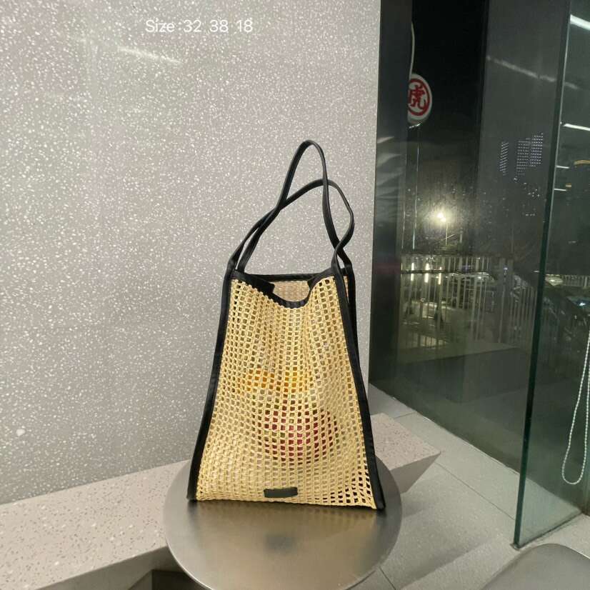 Ins Style Resort Beach Bag New Fashionable Simple Handbag One Shoulder Underarm Hollow Grass Woven Seaside Fake Mother And Child Bag KQ