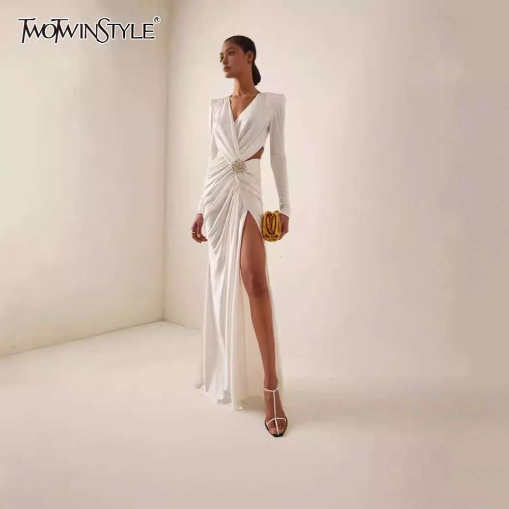 TWOTWINSTYLE Solid Fashion Spliced Fold Dresses For Women V Neck Long Sleeve Patchwork Hollow Out Dress Female Temperament Style
