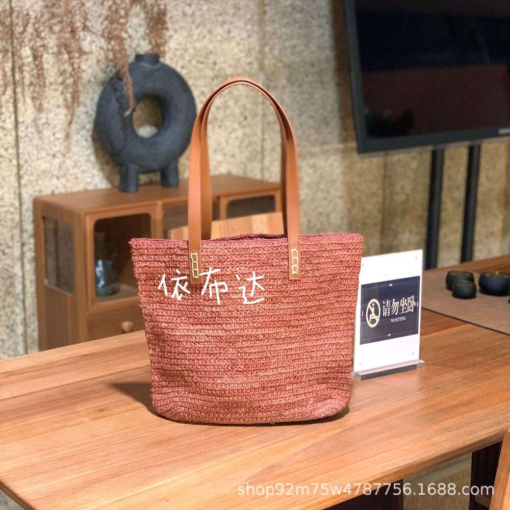 High quality Lafite patchwork leather strap shoulder bag, niche vacation style handmade grass woven tote bag