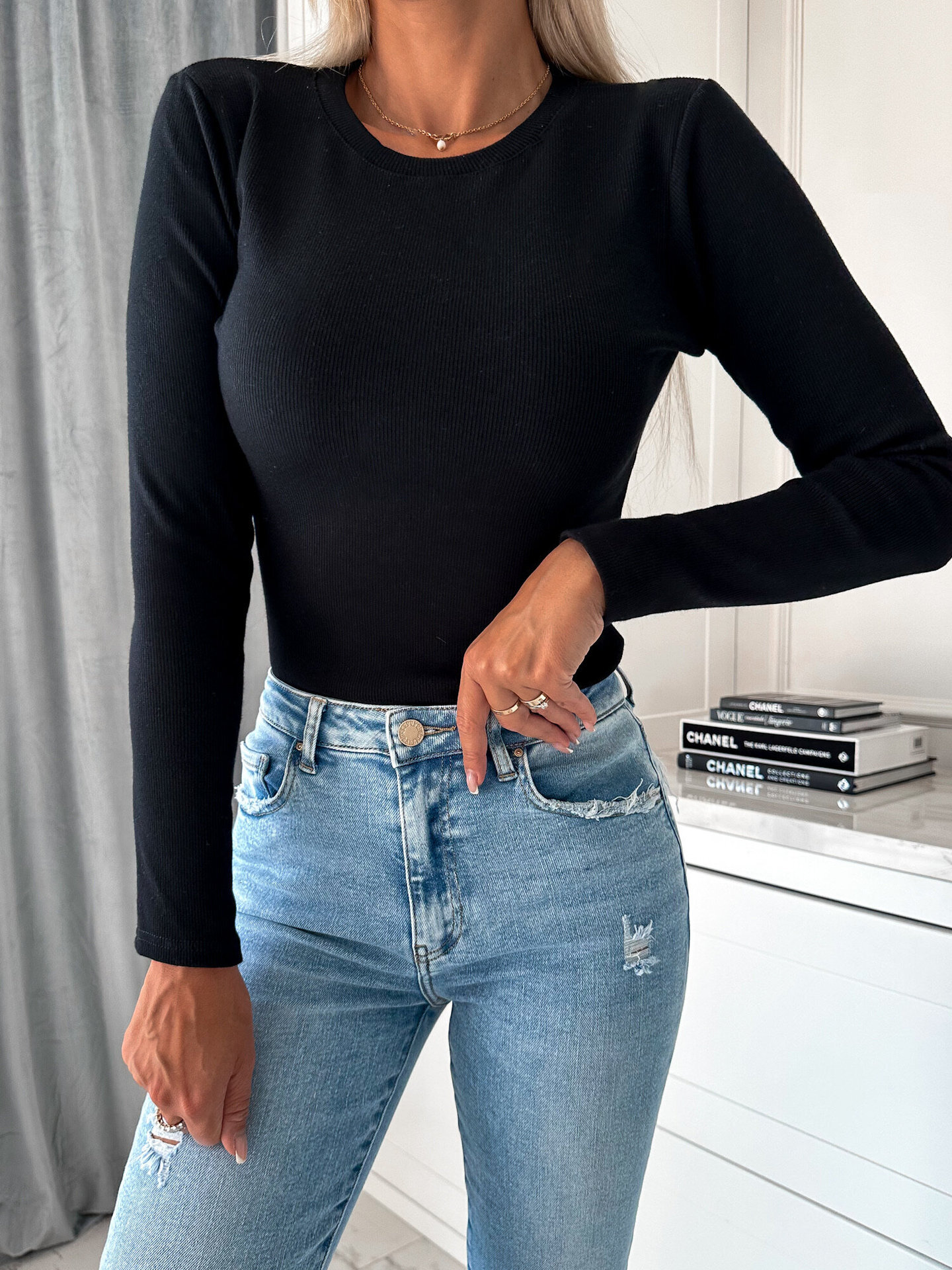 2023 autumn and winter simple solid color round neck new long sleeved knitted top for women