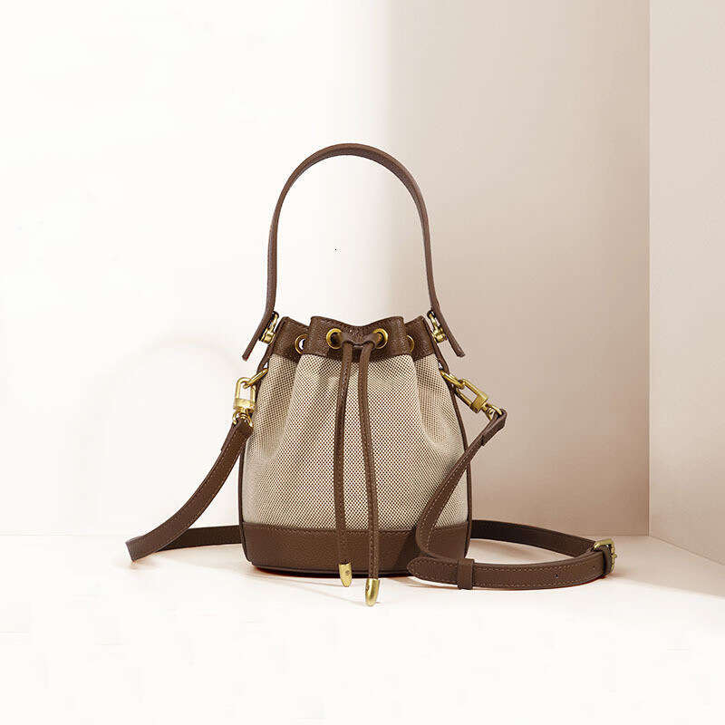 Small Niche Design Bucket Ladies New Trendy And High End Work Bag Hand Held Crossbody Canvas Bag