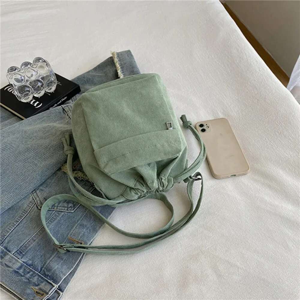Designer Bag New Women Middle Shoulder Korean Style Drawstring Bucket Casual Light Youth Crossbody Bag Whole Sale