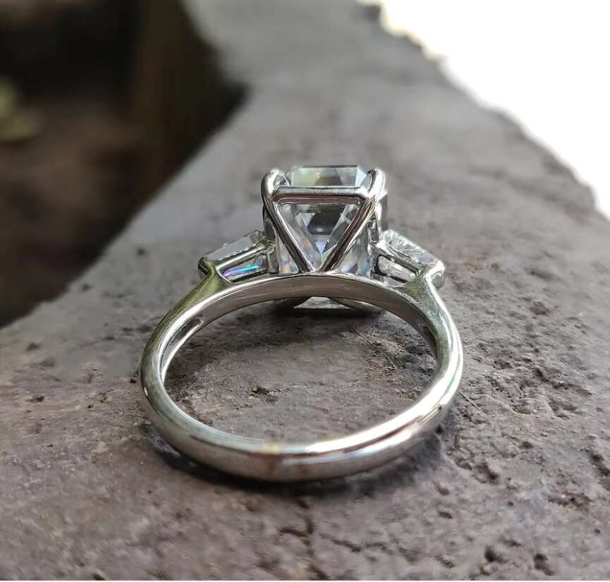 White Gold 3.89 TCW Emerald and Tapered Baguette Three Stone Engagement Moissanite Ring