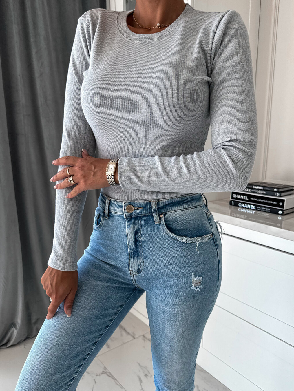 2023 autumn and winter simple solid color round neck new long sleeved knitted top for women