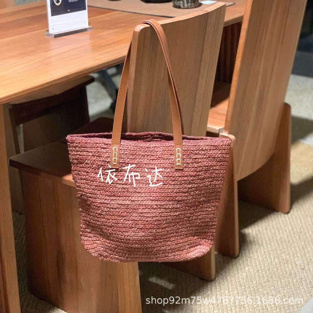 High quality Lafite patchwork leather strap shoulder bag, niche vacation style handmade grass woven tote bag