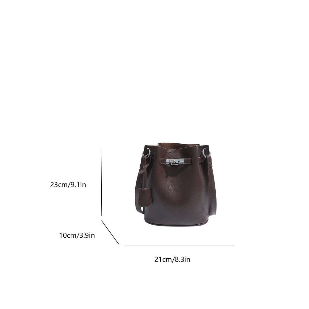 Simple Bucket Bag For Women's Daily Outings. A High - Quality Leather Bucket Bag In A Deep Brown Color, Exquisitely Adorned With