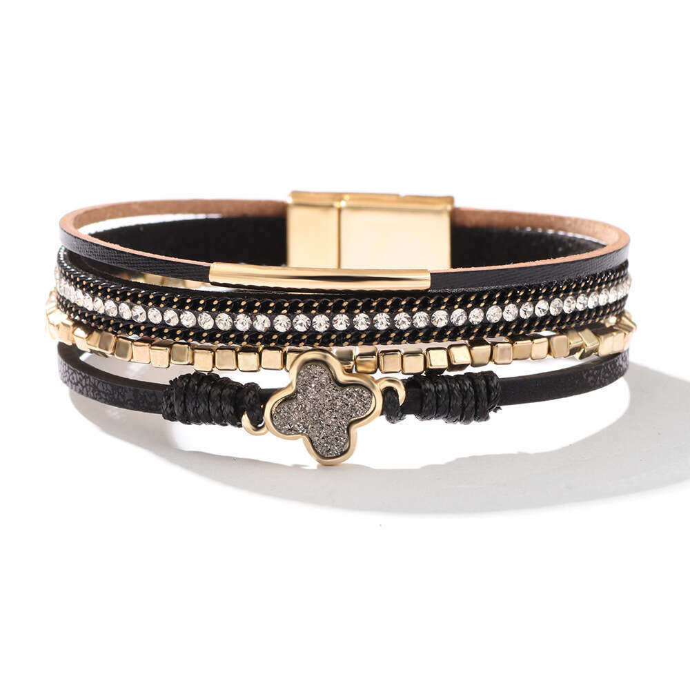 The new Bohemian four leaf clover studded dia multi-layer leather magnetic buckle is exquisite, fashionable, and high-end bracelet