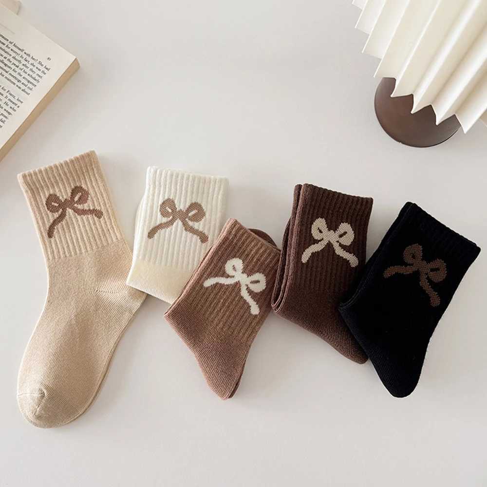 5 pairs stretchy solid-color sports socks for girls with bow patterns suitable for wearing in autumn and winter seasons G251124