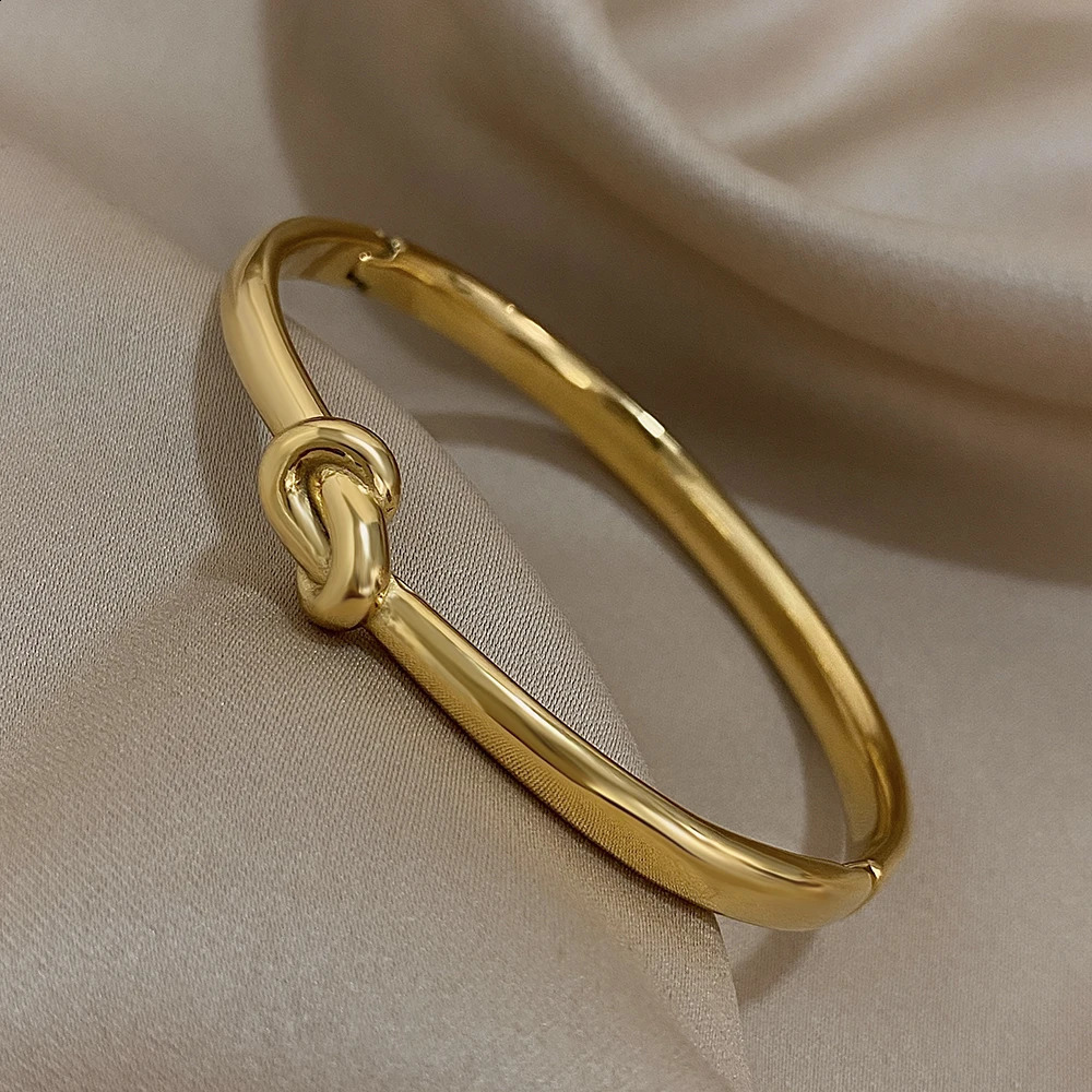 Simple thin stainless steel knot bracelet suitable for women unisex style gold cuffs waterproof and stackable jewelry gift 250415