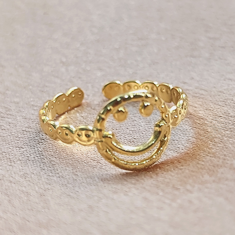 Top Source Korean version creative hollow smiling face titanium steel for women's fashion trendsetters, chain opening food ring
