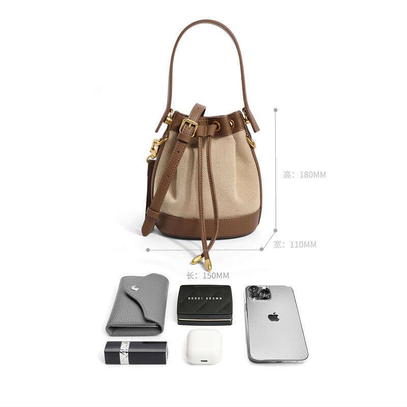 Small Niche Design Bucket Ladies New Trendy And High End Work Bag Hand Held Crossbody Canvas Bag