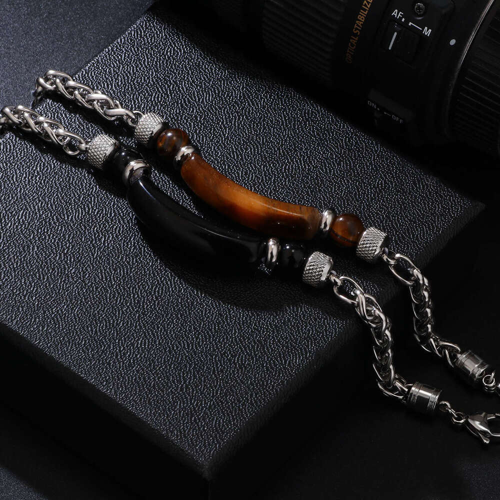 Natural for men, trendy, fashionable, personalized, and cool. Titanium steel chain splicing tiger eye stone men's bracelet