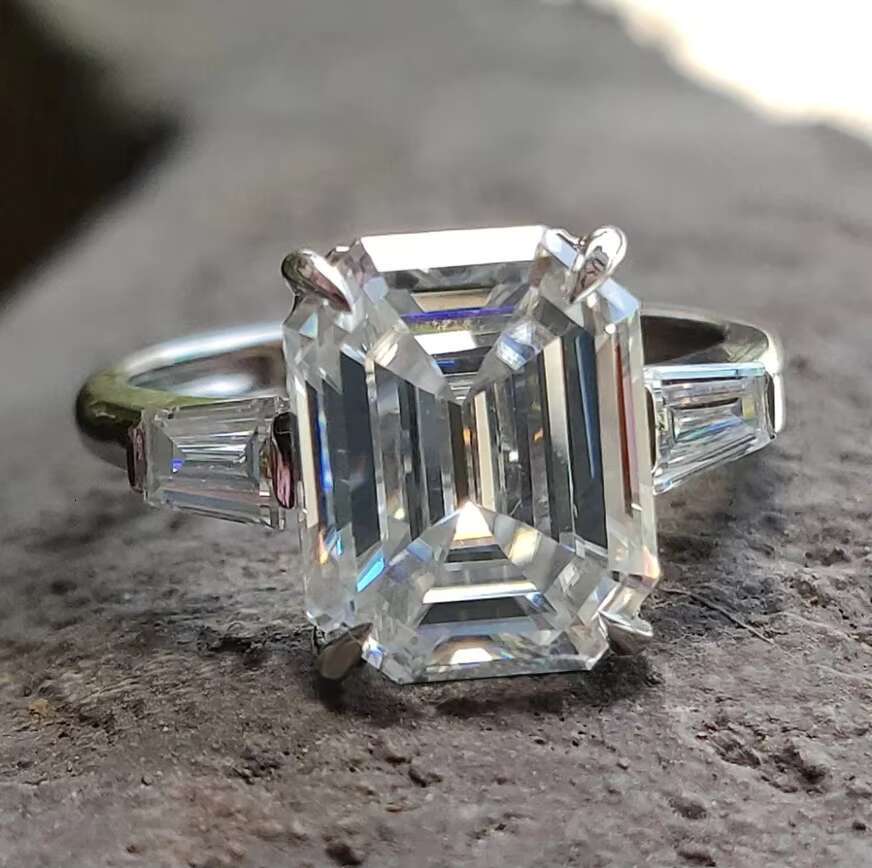 White Gold 3.89 TCW Emerald and Tapered Baguette Three Stone Engagement Moissanite Ring