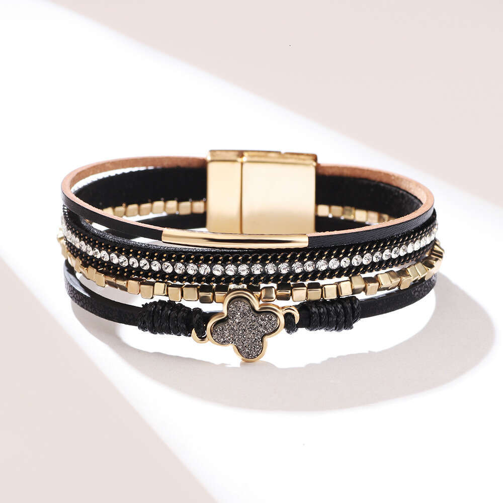 The new Bohemian four leaf clover studded dia multi-layer leather magnetic buckle is exquisite, fashionable, and high-end bracelet